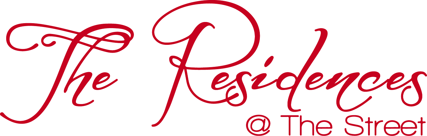 The Residences is written in red cursive on a green background.